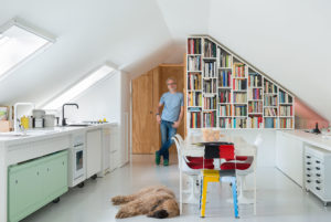 Alessio Riva Architect and his dog in his kitchen Photographer Maria Teresa Furnari
