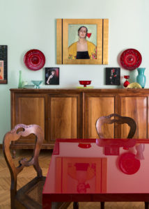 Red table in the Dining room of Elena Corner's house Photographer Maria Teresa Furnari
