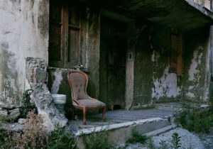 An armchair in a ruined house one of the trail of Giampilieri after the flood Photographer Maria Teresa Furnari